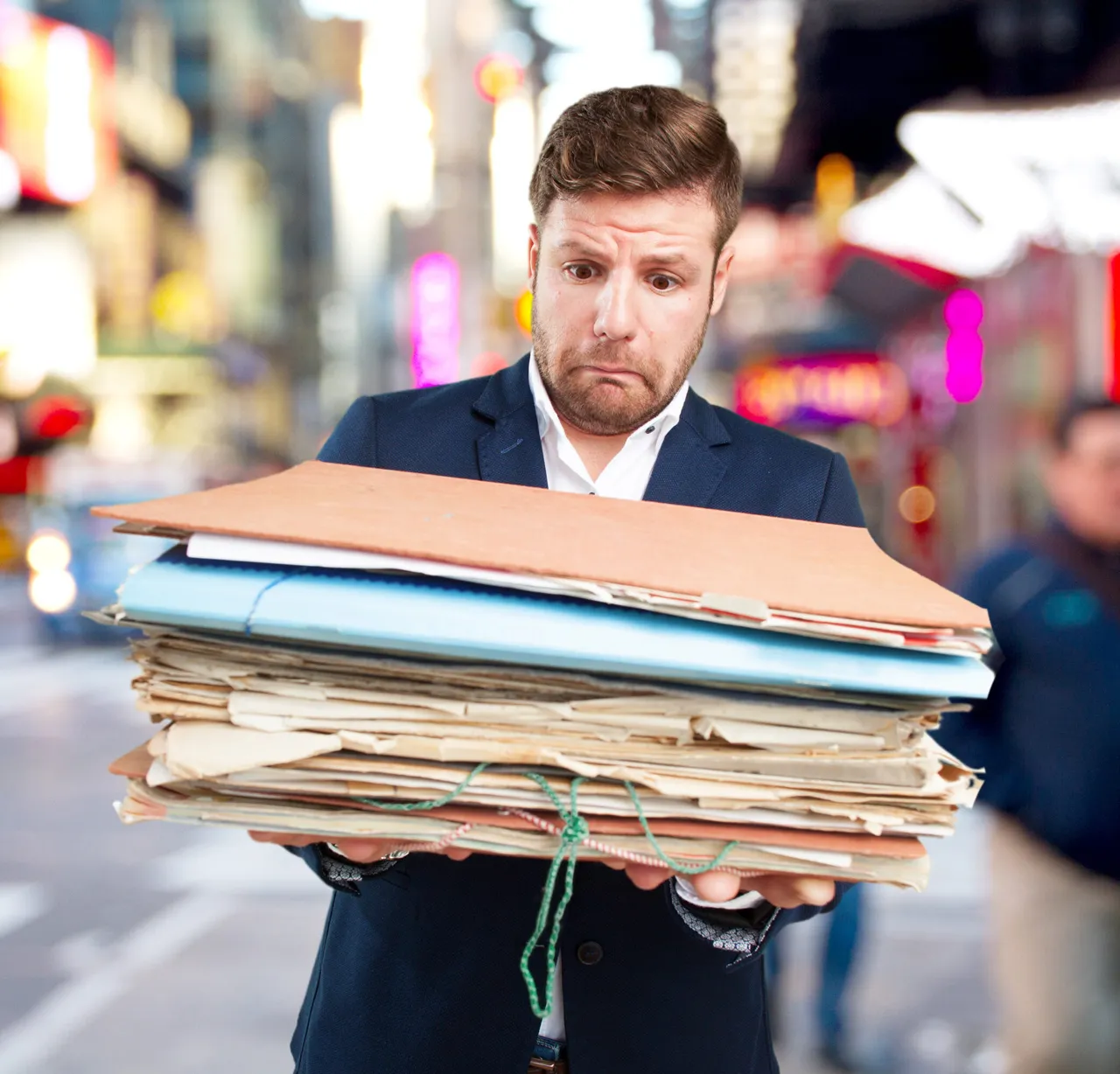 Man holding documents.