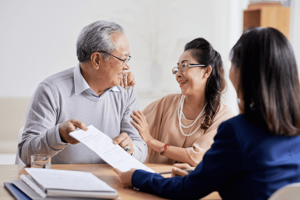 update your estate plan- Senior Couple Having Consultation